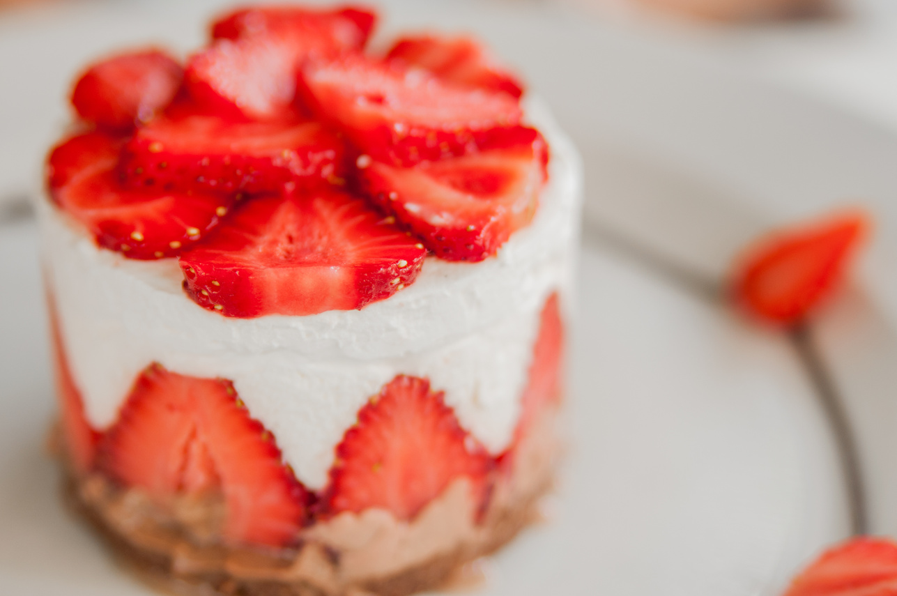 Closeup of Strawberry Cake with Fresh Strawberry on Wooden Backg